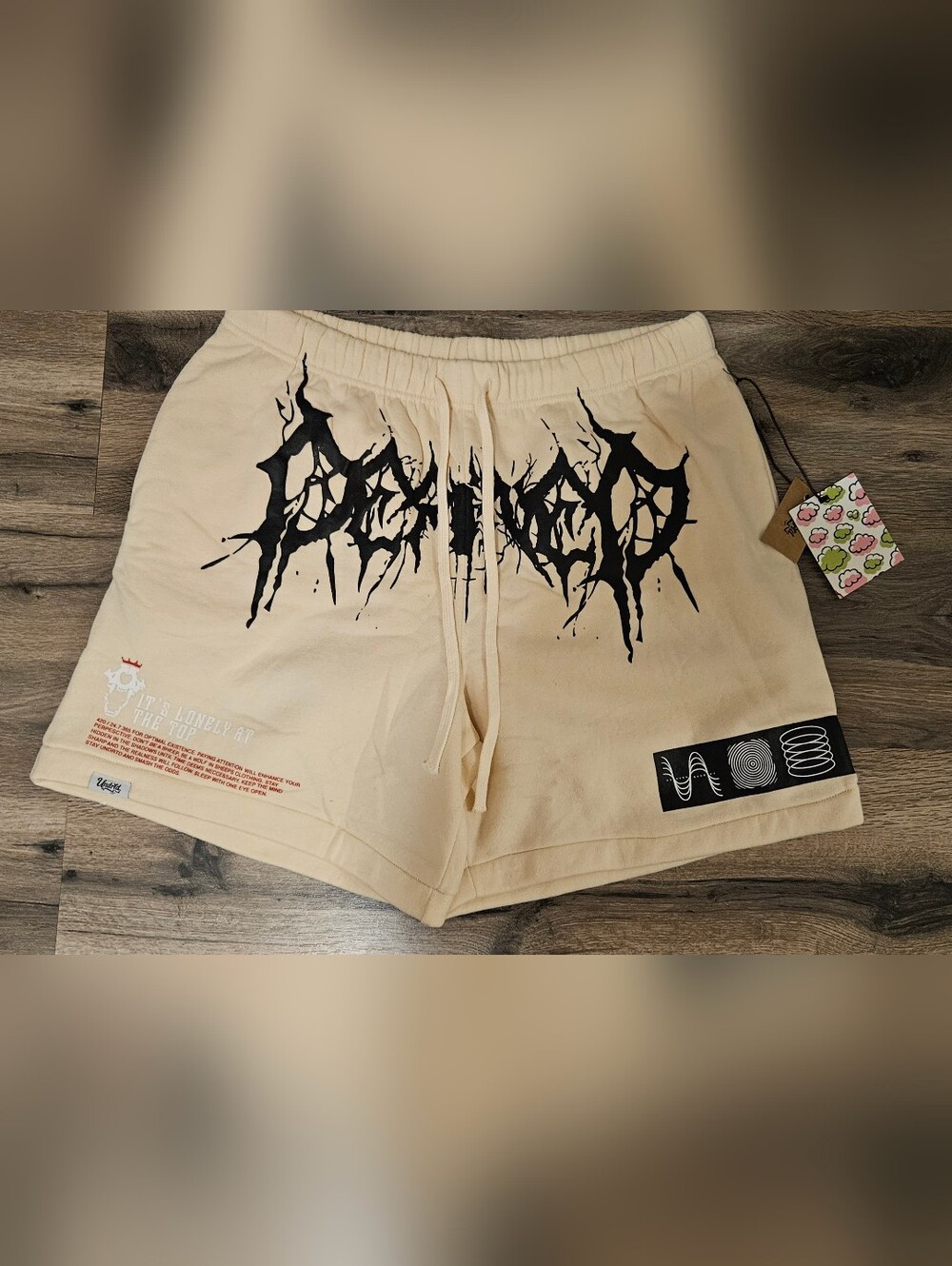 Men's Cream Graphic Athletic Drawstring Shorts with Black Accent